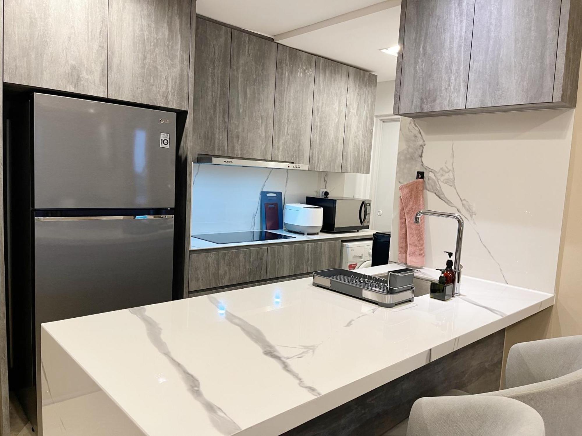 Gold Coast Pik Sea View Apartments By Longesuites Jakarta Szoba fotó
